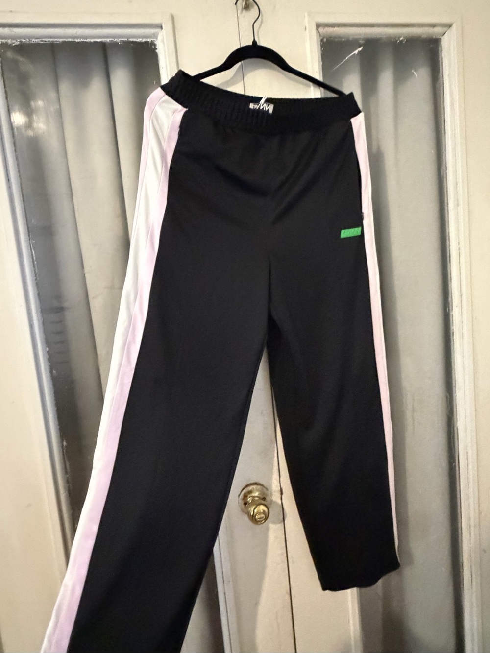 GANNI Women’s Black Track Pants with Pink Side Stripe